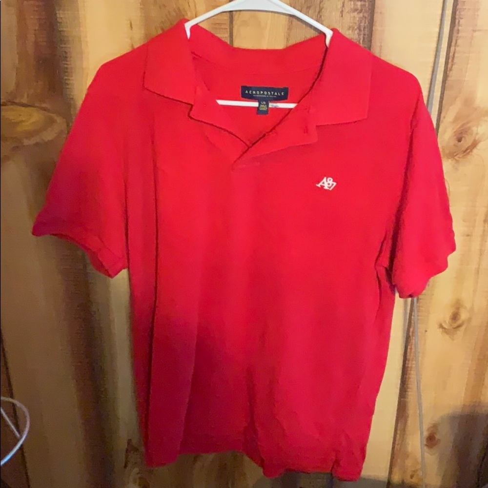 This is a red, polo Aeropostale shirt.